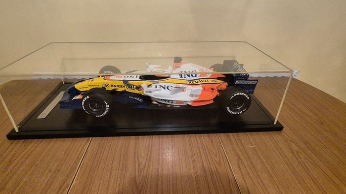 A 1:6 scale (32 inches long Formula 1 car) limited edition model of the 2007 Season ING Renault R27 F1 Team car
