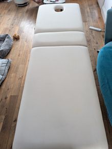 Massage table