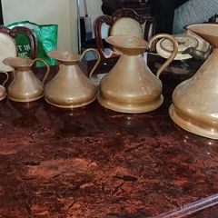 Antique large Haystack copper jug set of 7