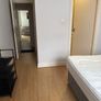 Room with double bed and attached washroom Image 6