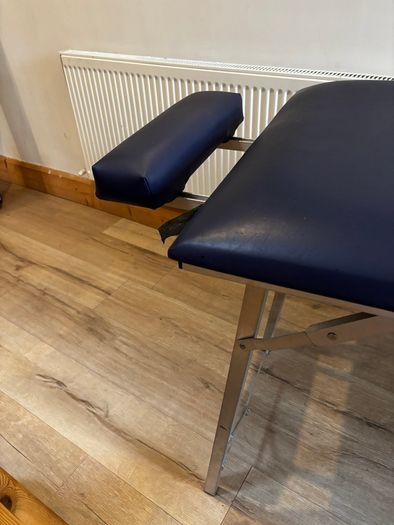 Massage table