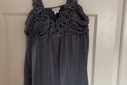 Top grey dressy with raised detail at neck