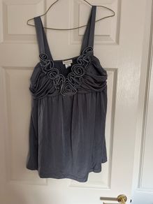 Top grey dressy with raised detail at neck