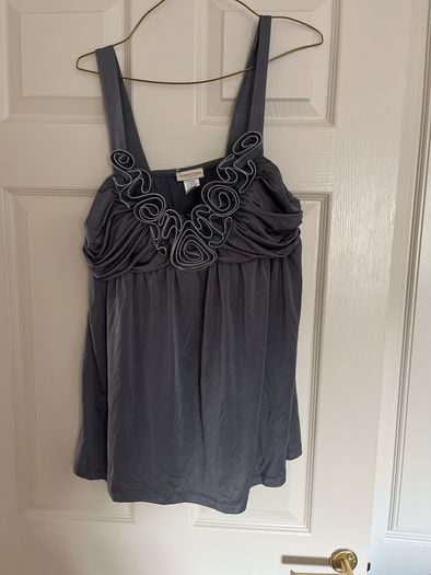 Top grey dressy with raised detail at neck
