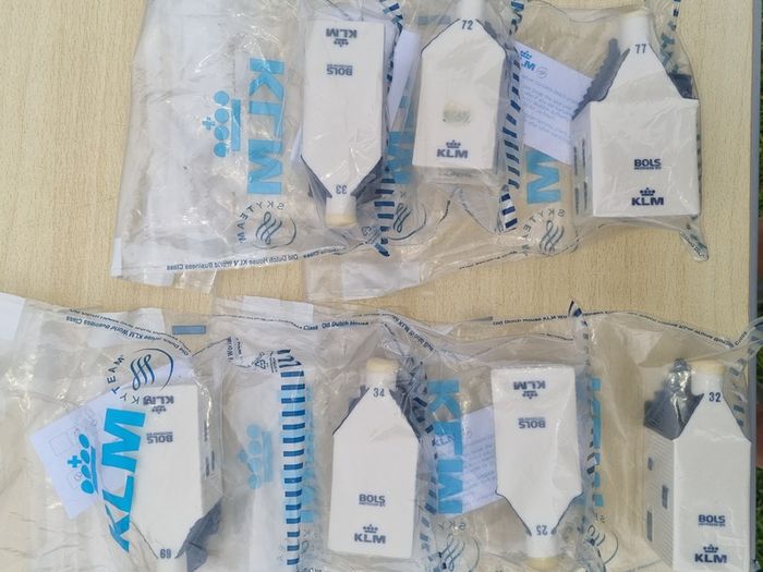 Collection of 7 porcelain miniature KLM Delft Blue houses