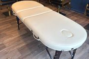 Massage table
