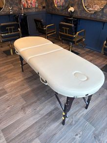 Massage table