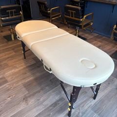 Massage table