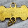 Some sort of gold color medal 1955 Image 2