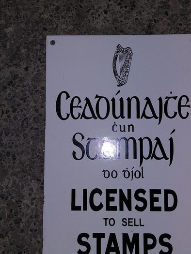 Irish antique style Enamel and Metal Sign. Licensed to Sell Stamps