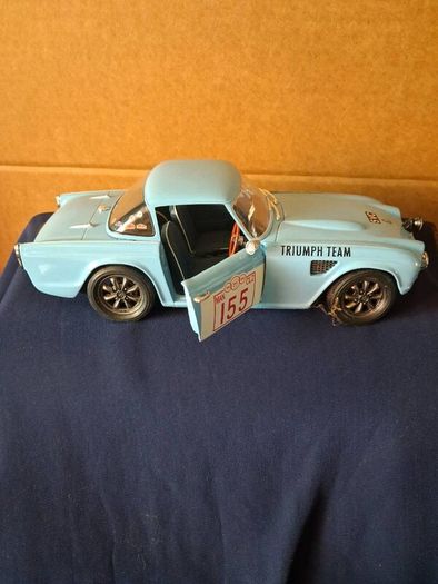 Model cars and bar signs