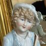 Antique bisque figure of young musician. Image 2
