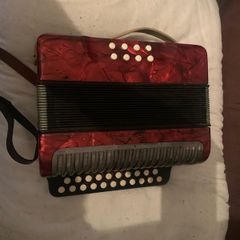 Button Accordion Sold