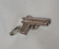 Sterling silver charm - Gun
