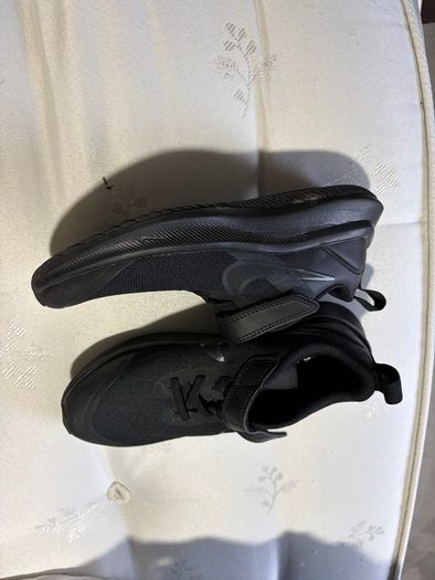 Boys Nike black trainers