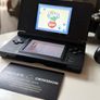 Nintendo DS Lite Black Handheld Console Bundle - Charger & Sims 2 Pets Image 2