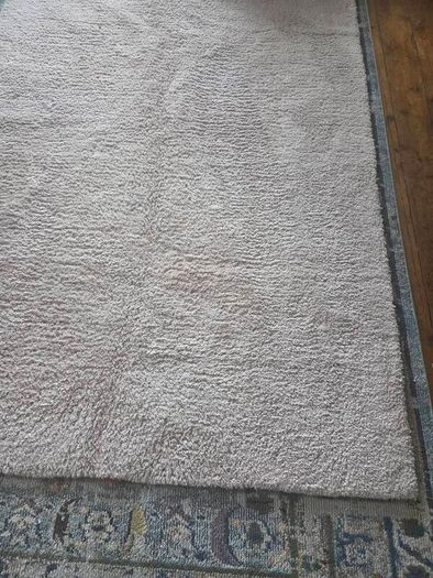 large plush rug, beige