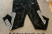 Adidas track suit pants, 15 to 16, never worn