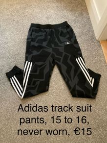 Adidas track suit pants, 15 to 16, never worn