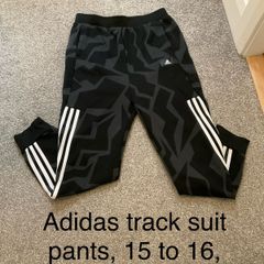 Adidas track suit pants, 15 to 16, never worn