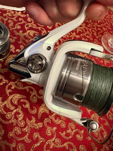 shimano stradic 4000 with spare spool and spiderwire braid