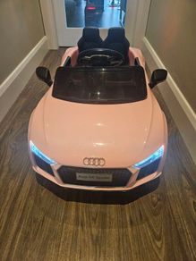 Girls ride on electric car