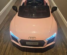 Girls ride on electric car