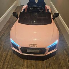 Girls ride on electric car