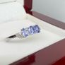 Silver Tanzanite Trilogy Ring in Platinum Overlay Sterling Silver. Image 8
