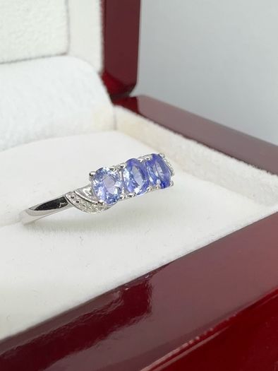 Silver Tanzanite Trilogy Ring in Platinum Overlay Sterling Silver.