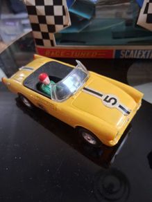 Scalextric slot cars. Yellow Sunbeam Tiger & Blue Triumph.
