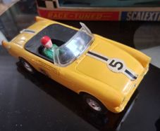 Scalextric slot cars. Yellow Sunbeam Tiger & Blue Triumph.