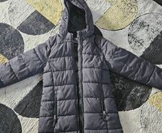 Black Karrimor Coat aged 11-12.