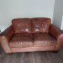 2 seater brown leather sofa. Approx 150cm width, approx 90cm breadth/ from back to front Image 4