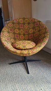 Vintage swivel saucer chair
