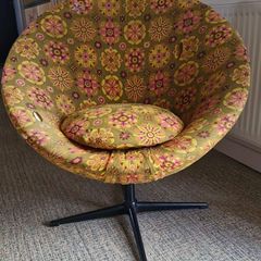 Vintage swivel saucer chair