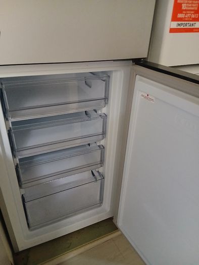 Indesit Fridge Freezer, free standing.
