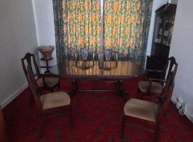 Antique mahogany dining table and chairs