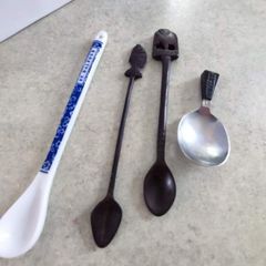 Selection of over sea jam spoons.