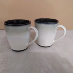 2 Glazed ceramic mugs