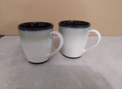 2 Glazed ceramic mugs