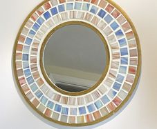 Round mosaic mirror with handcrafted blue and peach mosaic tiles