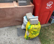 2 bags of rubble and broken blocks