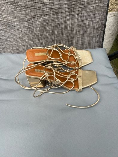 Ladies gold sandals size 4