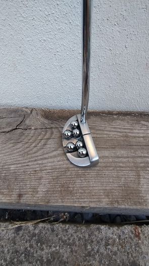Putting with Balls