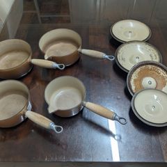 Le Creuset pots cast iron with lids and storage