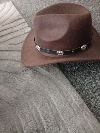 Cowboy Hats/ Brown and white and a light brown for sale .