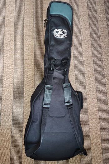 Yamaha F310 acoustic guitar + TKL HD gig bag