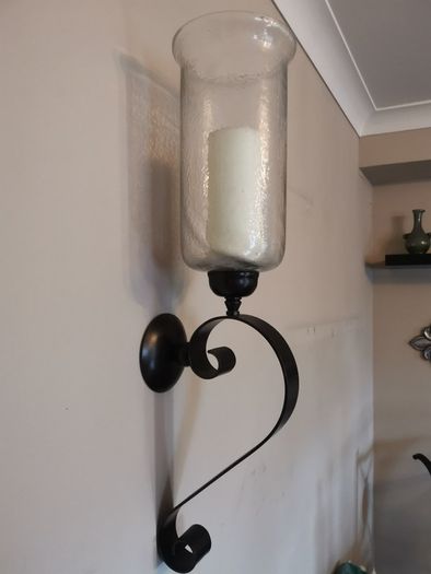 Pune black metal candle wall sconce