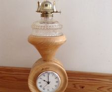 Wooden oil lamp with clock